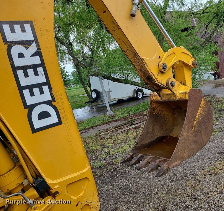 image for item LE9042 1999 John Deere 310E  backhoe