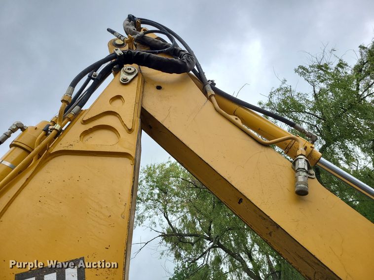 image for item LE9042 1999 John Deere 310E  backhoe