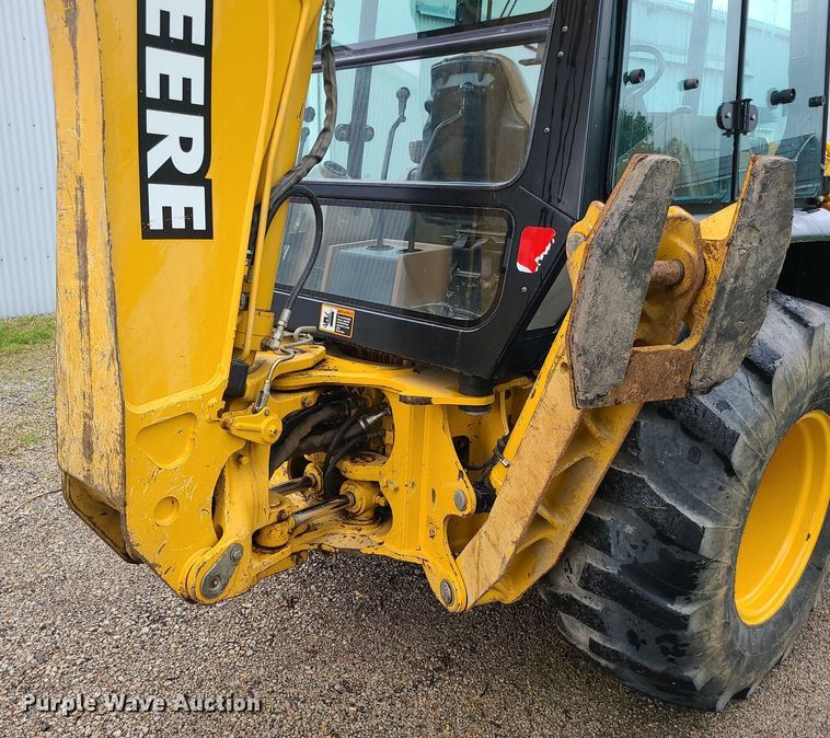 image for item LE9042 1999 John Deere 310E  backhoe