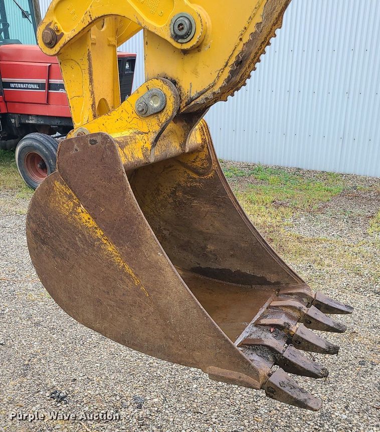 image for item LE9042 1999 John Deere 310E  backhoe