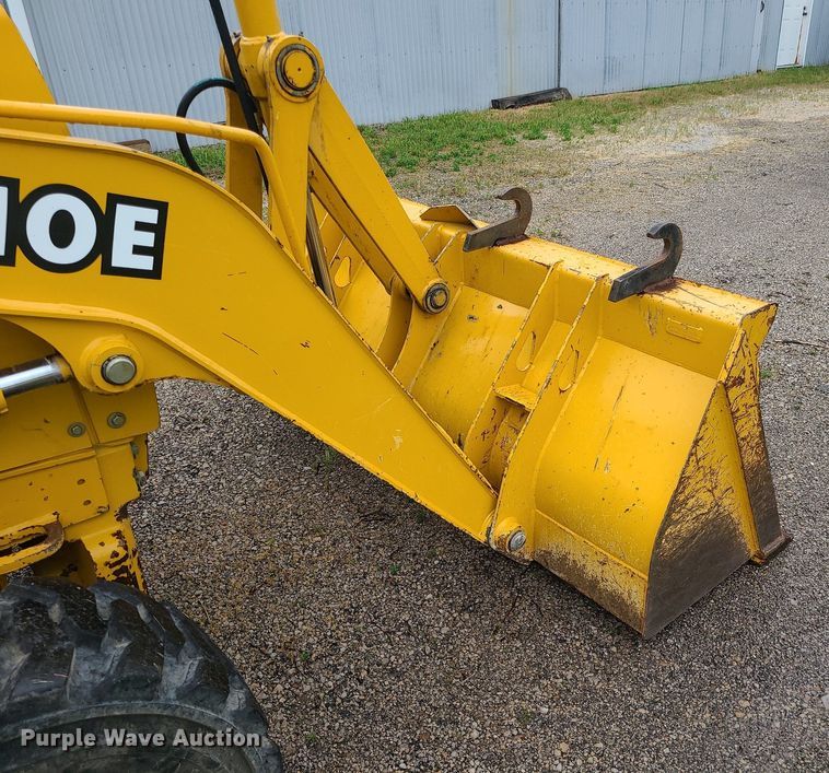 image for item LE9042 1999 John Deere 310E  backhoe