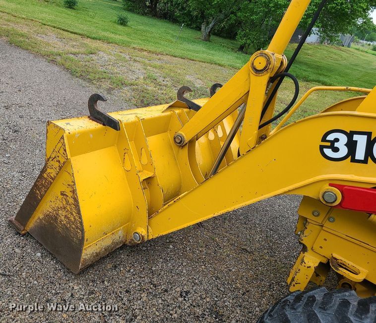 image for item LE9042 1999 John Deere 310E  backhoe