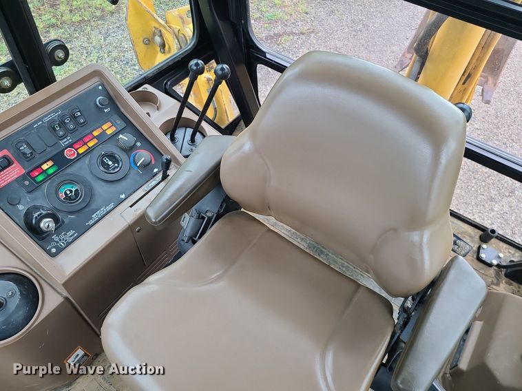 image for item LE9042 1999 John Deere 310E  backhoe