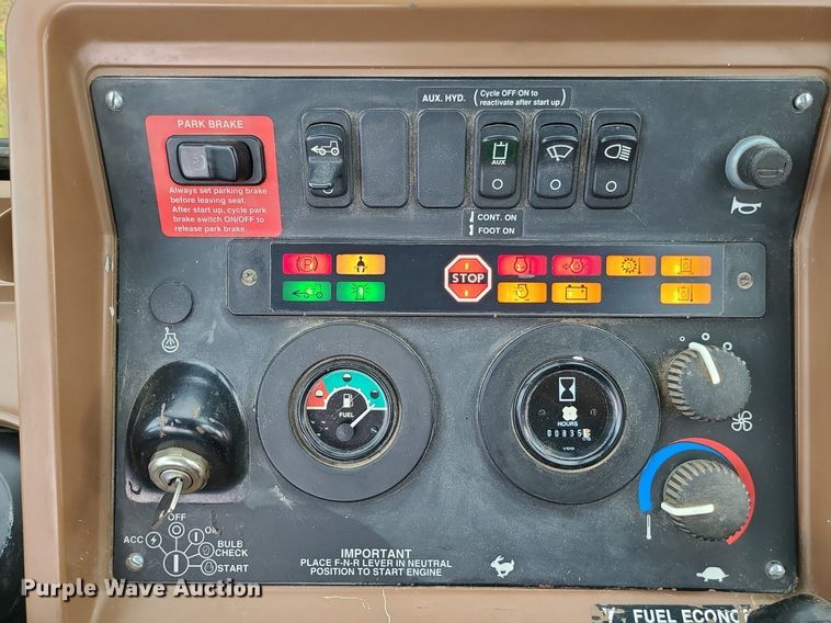 image for item LE9042 1999 John Deere 310E  backhoe