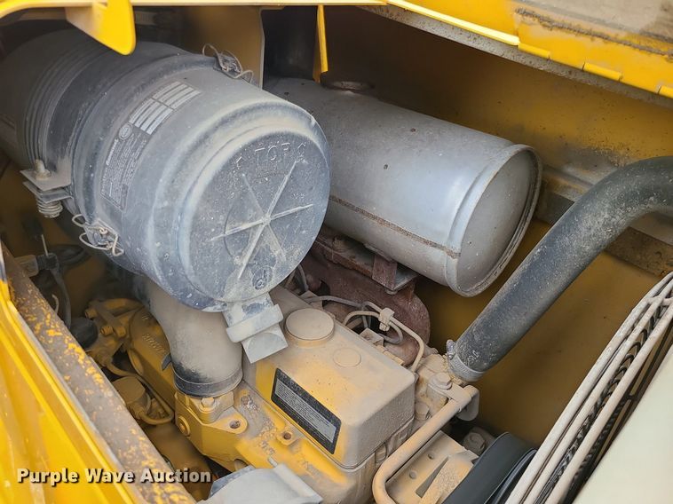 image for item LE9042 1999 John Deere 310E  backhoe