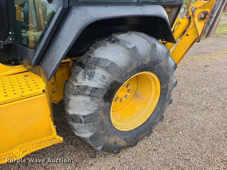 image for item LE9042 1999 John Deere 310E  backhoe