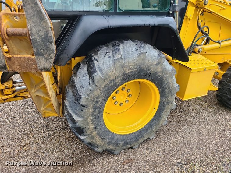 image for item LE9042 1999 John Deere 310E  backhoe