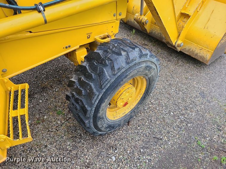 image for item LE9042 1999 John Deere 310E  backhoe