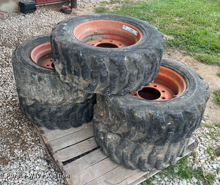 image for item LI9675 (5) Bobcat 10-16.5 skid steer wheels and tires