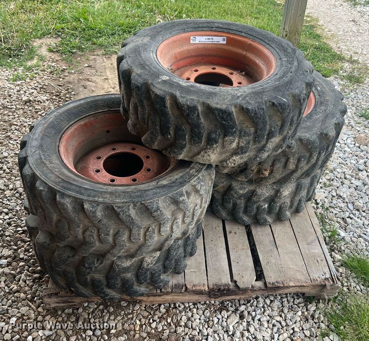 image for item LI9675 (5) Bobcat 10-16.5 skid steer wheels and tires