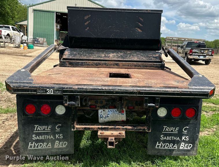 image for item DO5007 2011 Ford F350 Super Duty  SuperCab bale bed pickup truck