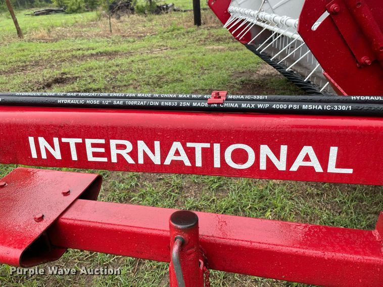 image for item LY9679 International 990  swather / windrower