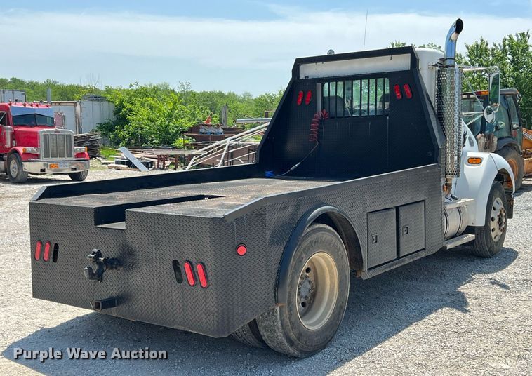 image for item LG9126 1999 Kenworth T300  flatbed truck