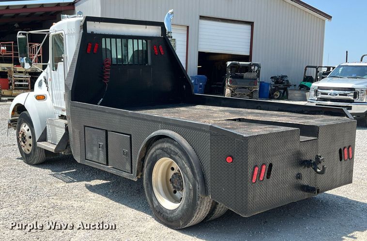 image for item LG9126 1999 Kenworth T300  flatbed truck