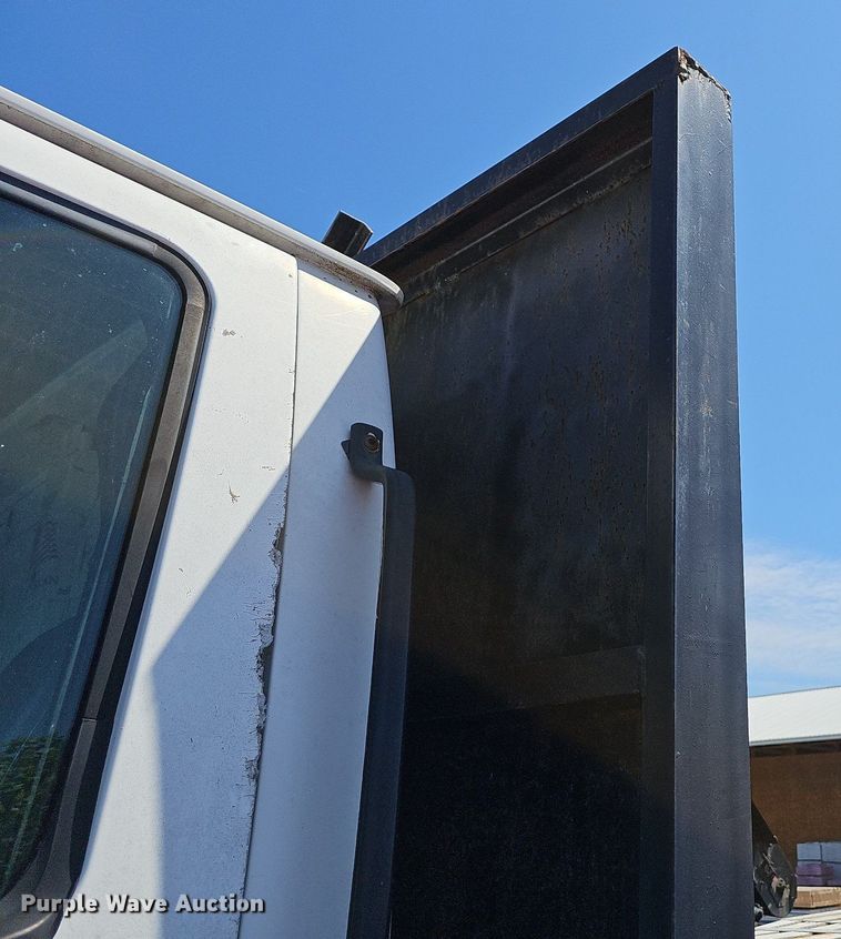 image for item LW9610 1998 Ford L8501  flatbed truck