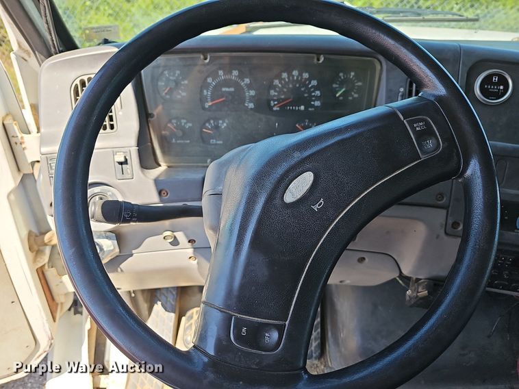 image for item LW9610 1998 Ford L8501  flatbed truck