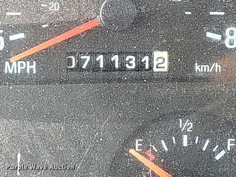 image for item LW9610 1998 Ford L8501  flatbed truck