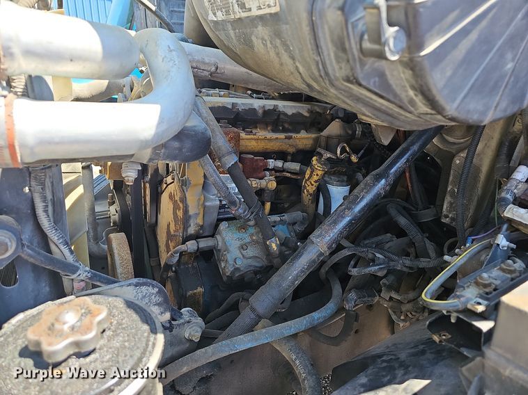 image for item LW9610 1998 Ford L8501  flatbed truck