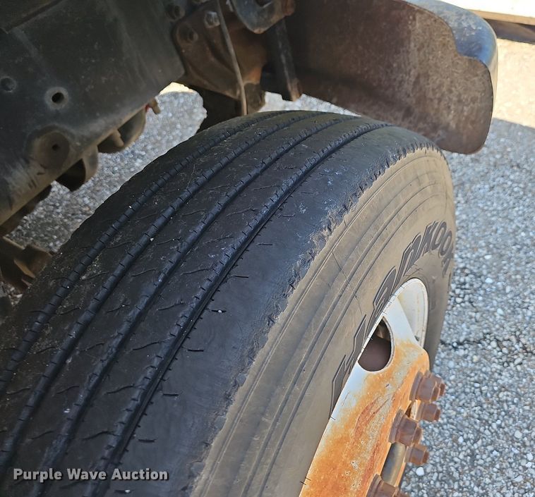 image for item LW9610 1998 Ford L8501  flatbed truck