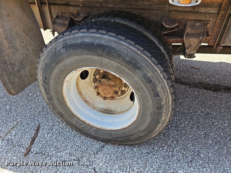 image for item LW9610 1998 Ford L8501  flatbed truck