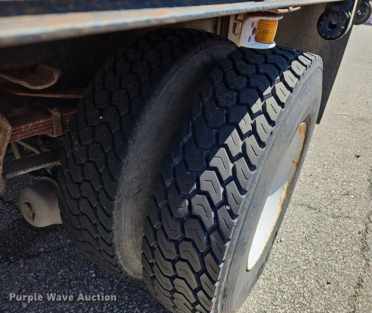 image for item LW9610 1998 Ford L8501  flatbed truck