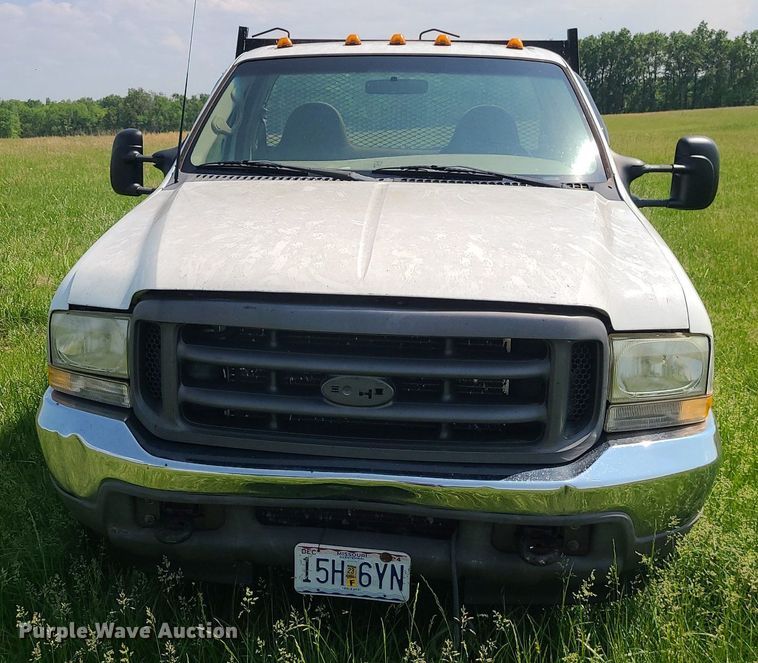 image for item DC6064 2002 Ford F350 Super Duty XL  flatbed pickup truck