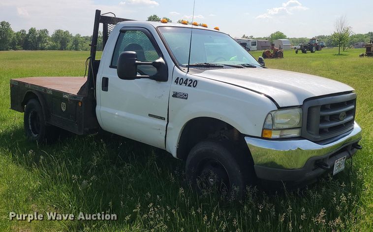 image for item DC6064 2002 Ford F350 Super Duty XL  flatbed pickup truck