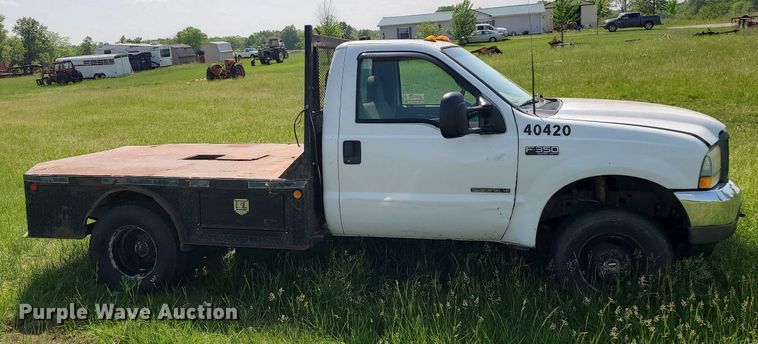 image for item DC6064 2002 Ford F350 Super Duty XL  flatbed pickup truck