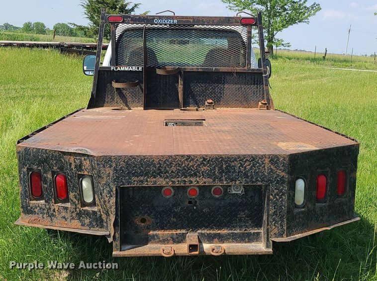 image for item DC6064 2002 Ford F350 Super Duty XL  flatbed pickup truck
