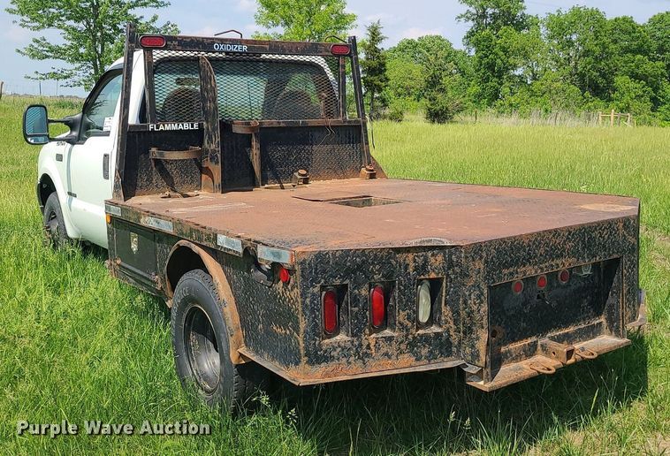 image for item DC6064 2002 Ford F350 Super Duty XL  flatbed pickup truck