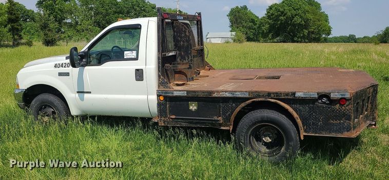 image for item DC6064 2002 Ford F350 Super Duty XL  flatbed pickup truck
