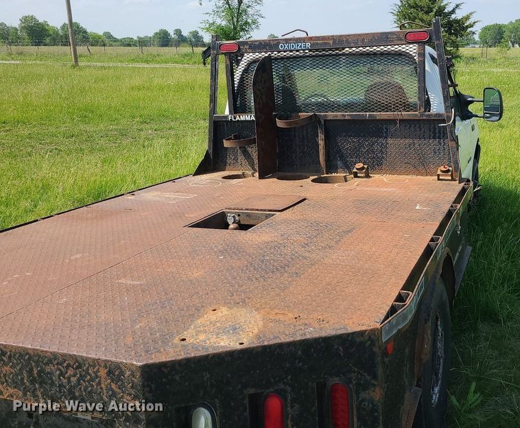 image for item DC6064 2002 Ford F350 Super Duty XL  flatbed pickup truck
