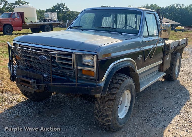 image for item DI7810 1986 Ford F250  bale bed pickup truck