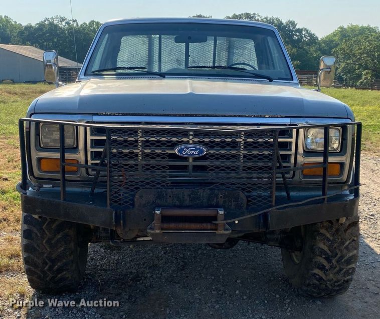 image for item DI7810 1986 Ford F250  bale bed pickup truck