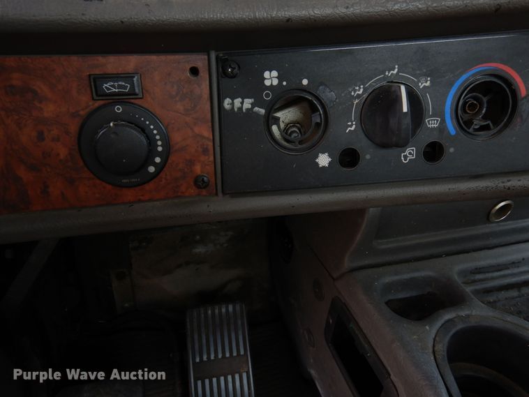 image for item DN6319 2003 Kenworth T300  rollback truck