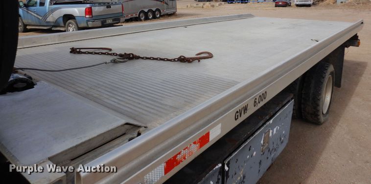 image for item DN6319 2003 Kenworth T300  rollback truck