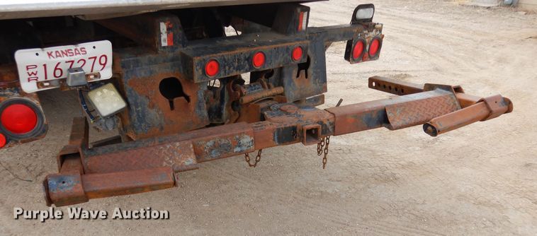 image for item DN6319 2003 Kenworth T300  rollback truck