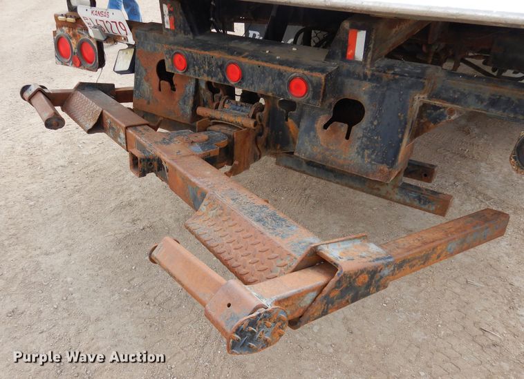 image for item DN6319 2003 Kenworth T300  rollback truck