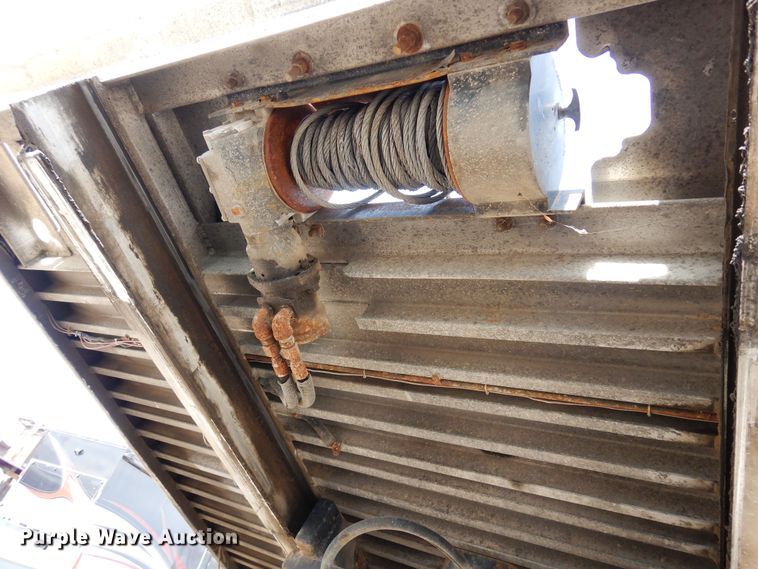 image for item DN6319 2003 Kenworth T300  rollback truck