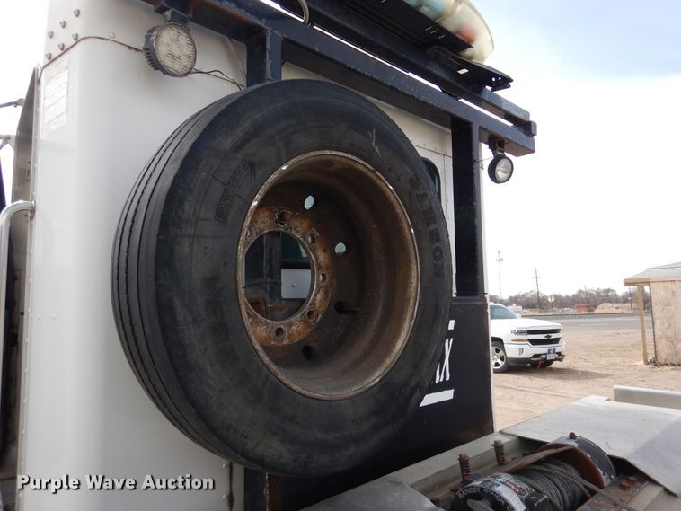 image for item DN6319 2003 Kenworth T300  rollback truck