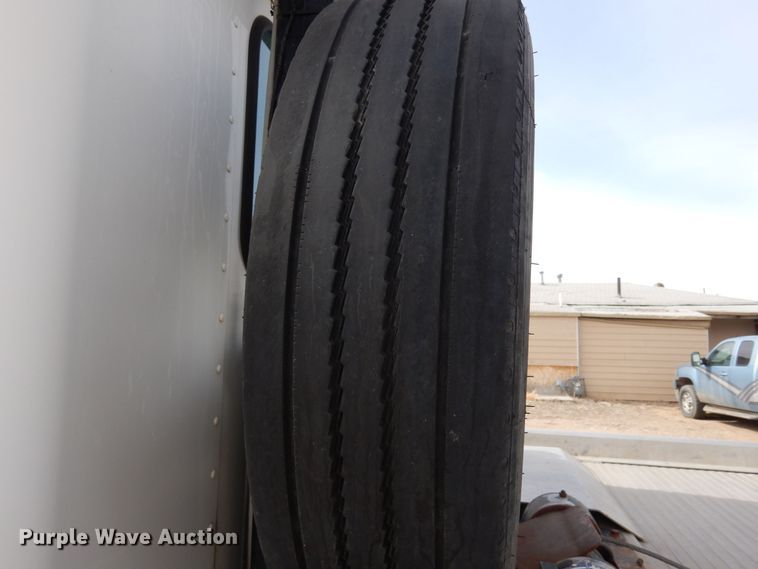 image for item DN6319 2003 Kenworth T300  rollback truck