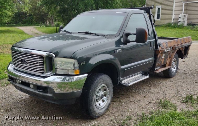 image for item LL9154 2003 Ford F250 Super Duty XL  flatbed pickup truck