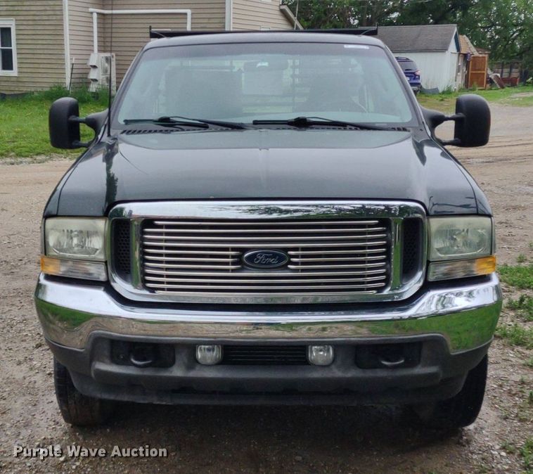 image for item LL9154 2003 Ford F250 Super Duty XL  flatbed pickup truck