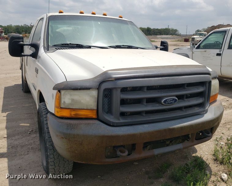 image for item LT9743 1999 Ford F350 Super Duty  SuperCab utility bed pickup truck