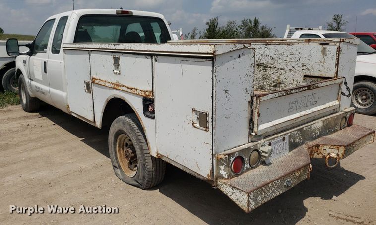 image for item LT9743 1999 Ford F350 Super Duty  SuperCab utility bed pickup truck