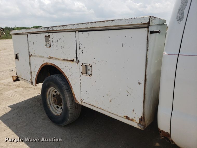 image for item LT9743 1999 Ford F350 Super Duty  SuperCab utility bed pickup truck