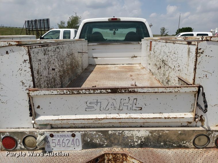 image for item LT9743 1999 Ford F350 Super Duty  SuperCab utility bed pickup truck