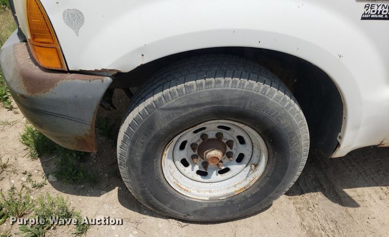 image for item LT9743 1999 Ford F350 Super Duty  SuperCab utility bed pickup truck