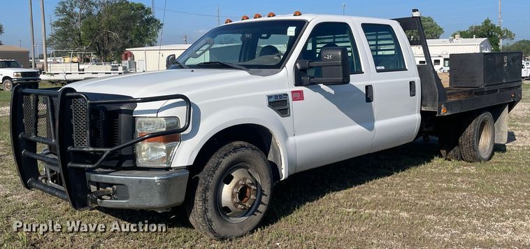 image for item LY9606 2009 Ford F350 Super Duty  Crew Cab flatbed pickup truck