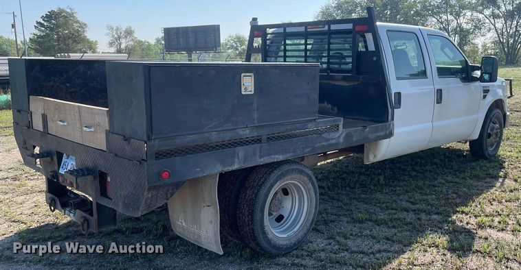 image for item LY9606 2009 Ford F350 Super Duty  Crew Cab flatbed pickup truck